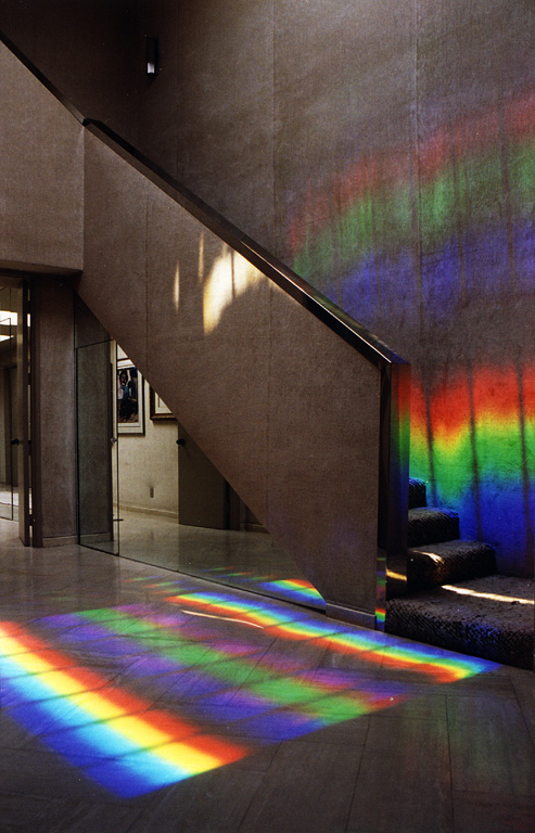 The floor is painted with ever changing carpets. of light. this is 100% sustainable green art